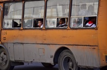 Students on bus, Old Havana, by marcorossimusic